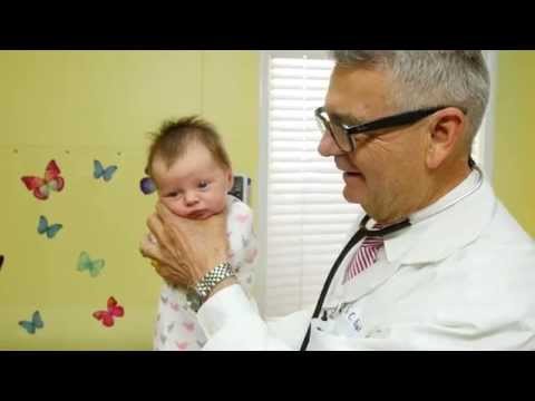 How To Calm A Crying Baby - Dr. Robert Hamilton Demonstrates &quot;The Hold&quot; (Official)